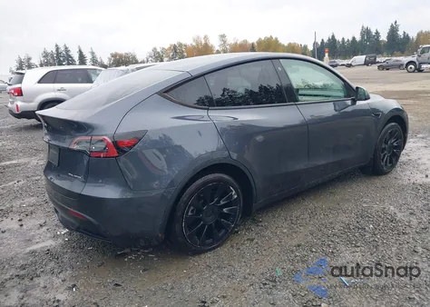 2022 Tesla Model Y Long Range Dual Motor All-Wheel Drive z USA, uszkodzony, nr VIN 7SAYGDEE8NF576652